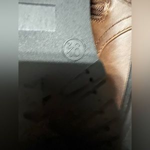 Size 9.5 brown boots. Brand new